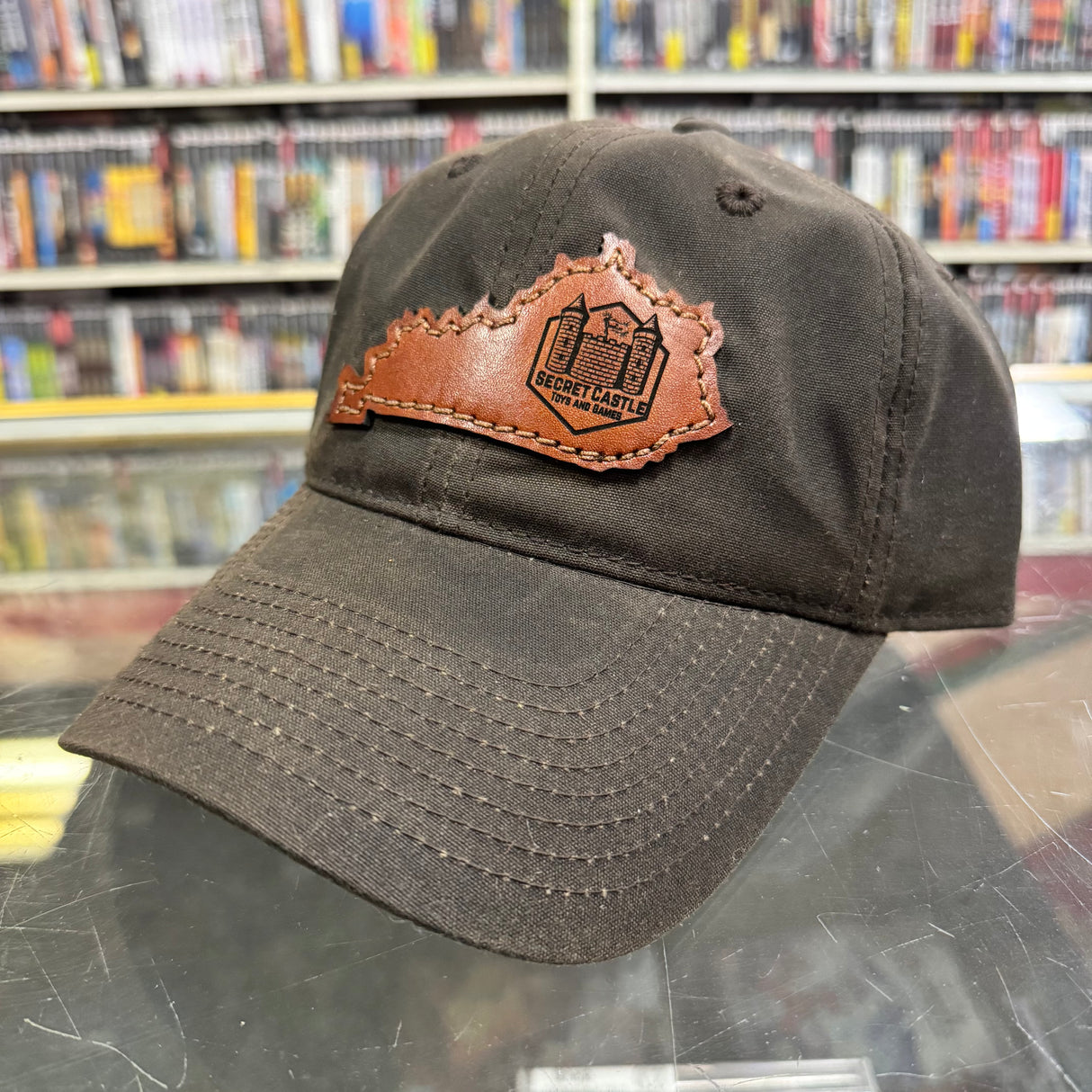 Brown Outdoor Secret Castle Kentucky Logo Wax Dad Hat