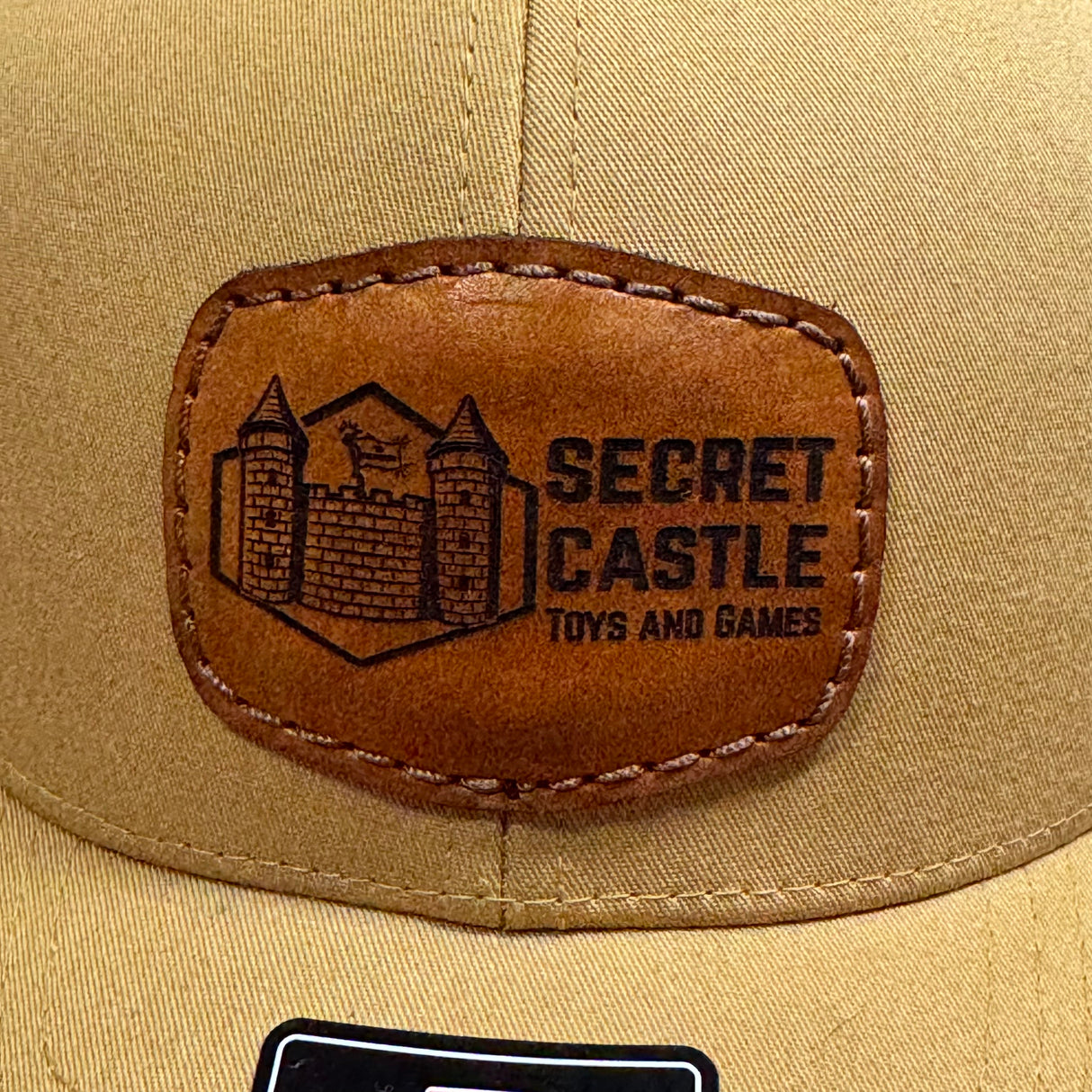 Solid Amber Gold Secret Castle Logo Mesh Richardson 112 Trucker Hat