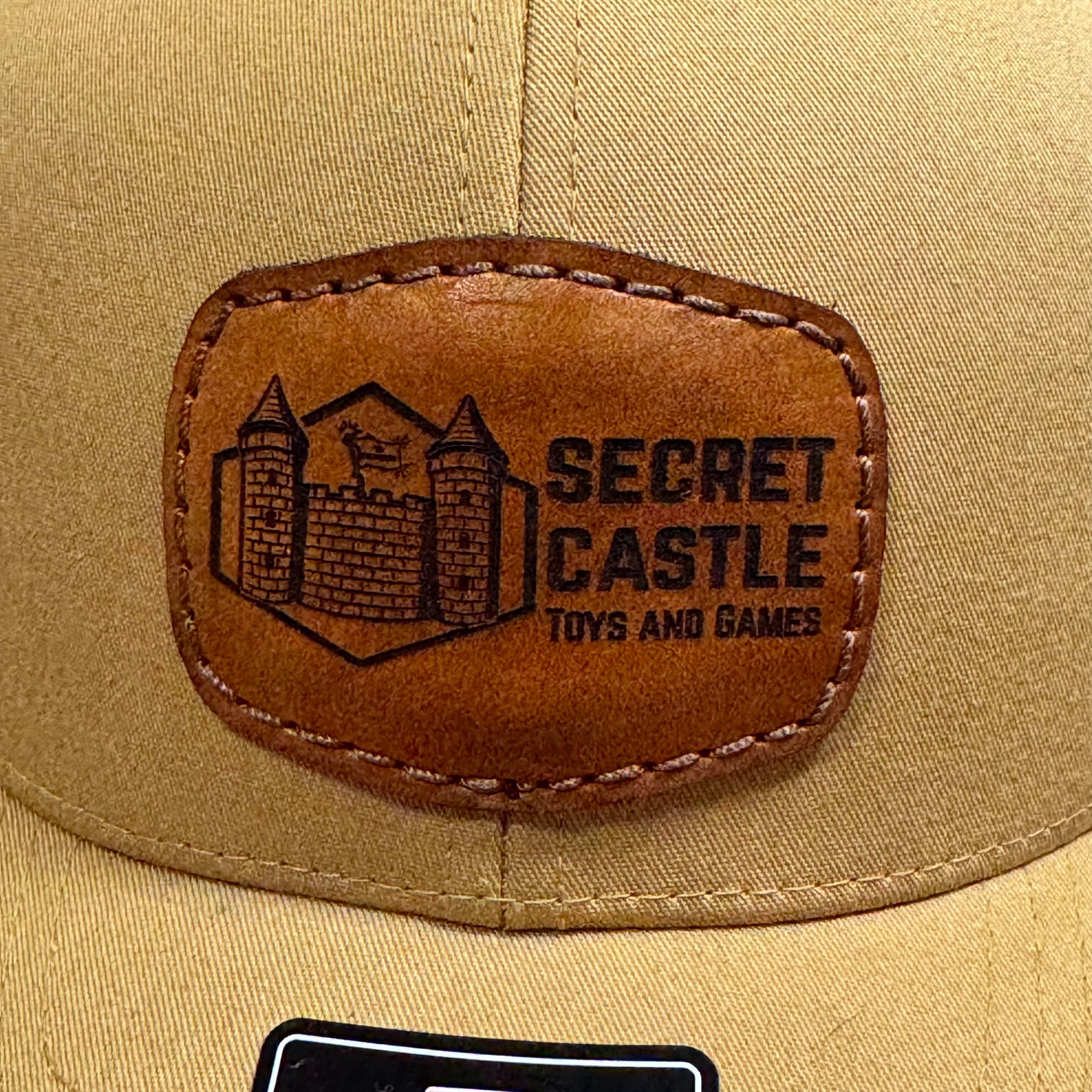 Solid Amber Gold Secret Castle Logo Mesh Richardson 112 Trucker Hat