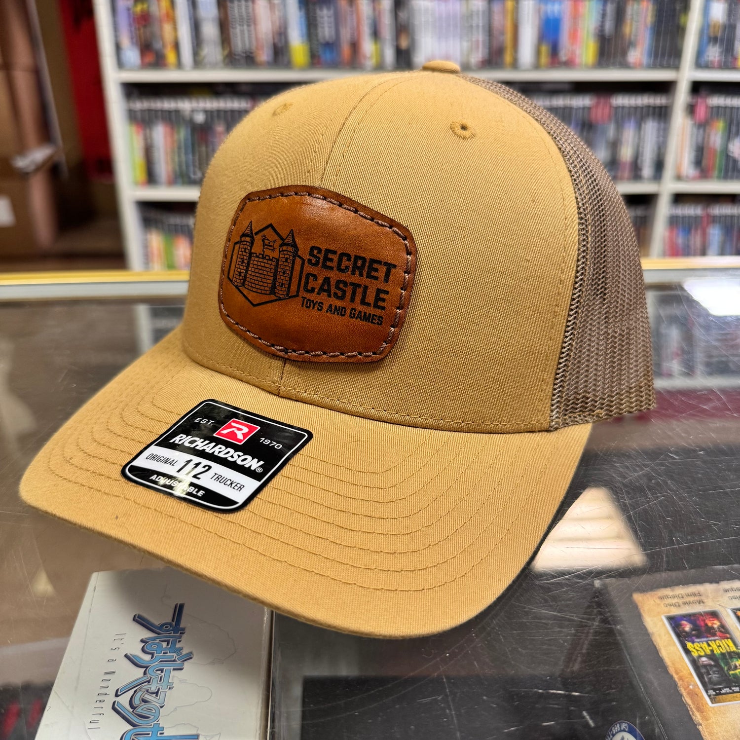 Solid Amber Gold Secret Castle Logo Mesh Richardson 112 Trucker Hat